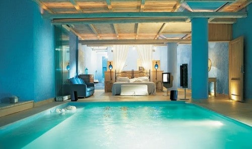 A kitchen with a blue pool of water, dream bedroom