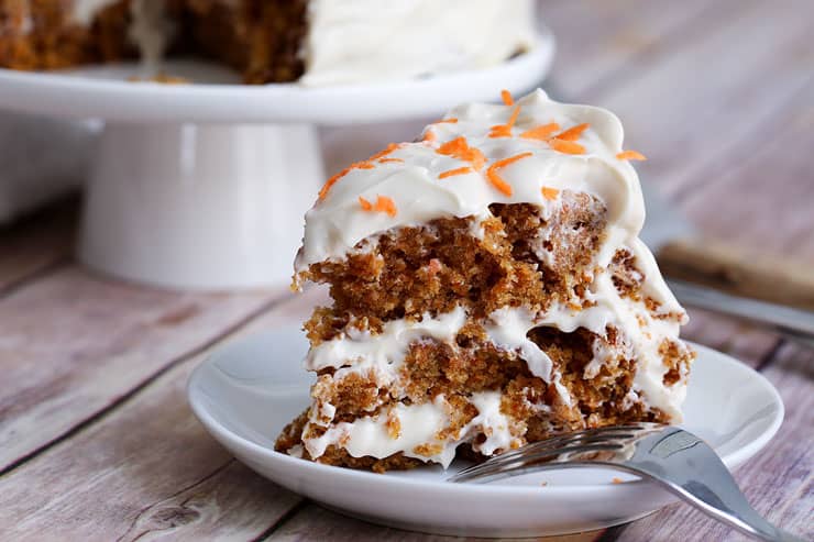 A piece of cake on a plate, with Carrot cake