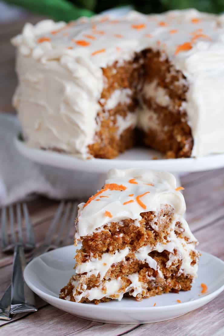 This easy Carrot Cake Recipe is moist and delicious, and has the perfect cream cheese icing ever. This cake is guaranteed to become one of your go-to dessert recipe for all occasions.