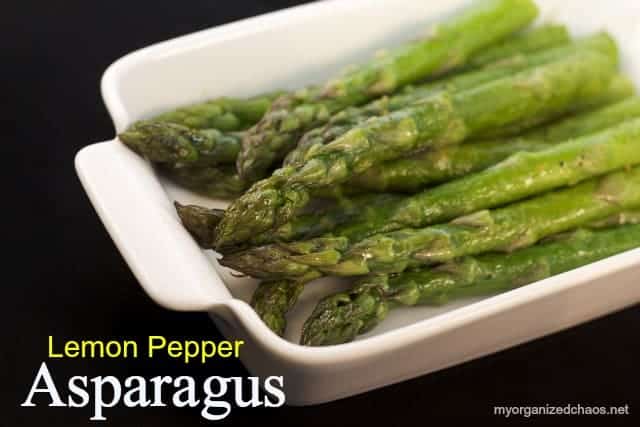 A plate of food with asparagus, with Whole30 