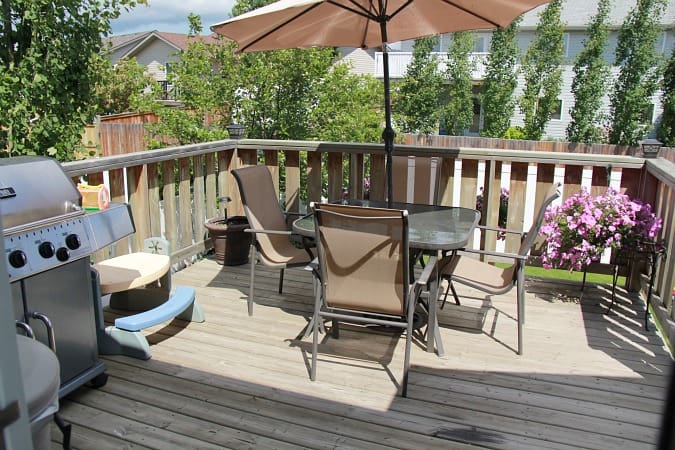 A patio set on a deck