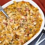 A bowl of food, with Chicken and Pasta