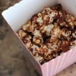 A container with food in it, with Popcorn