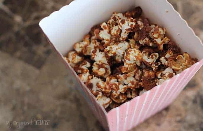 A container with food in it, with Popcorn