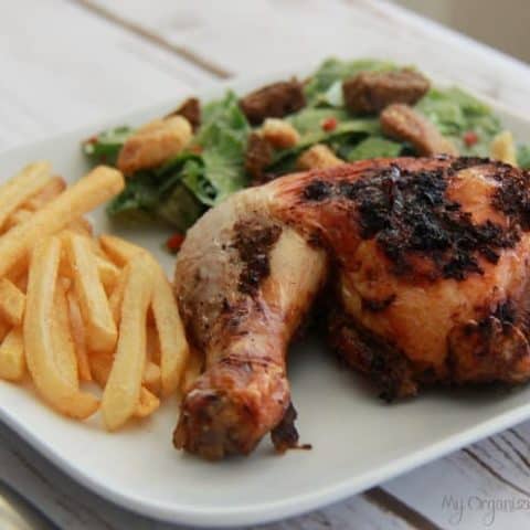 A plate of food, with Jerk Chicken