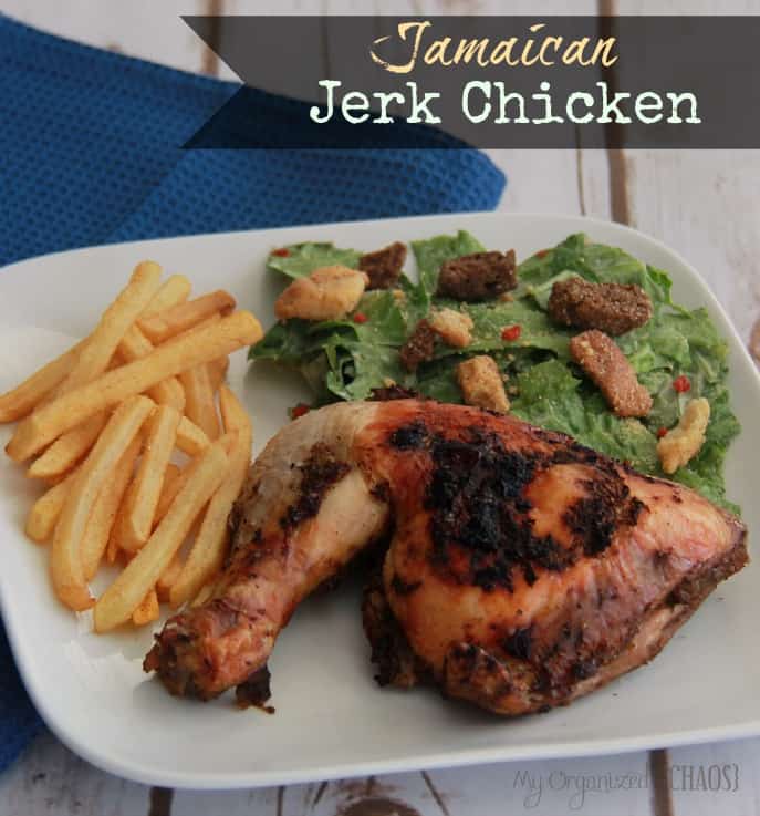 A plate of food on a table, with Chicken and Jerk