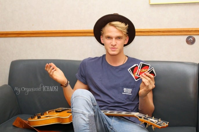 Cody Simpson sitting on a couch