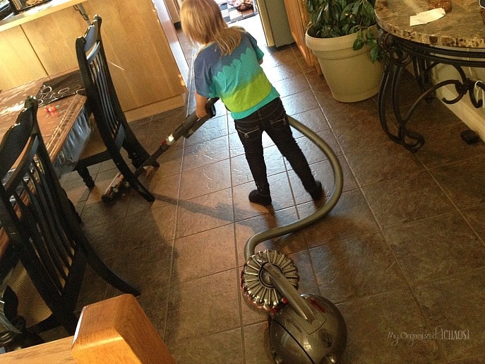 A person vacuuming 