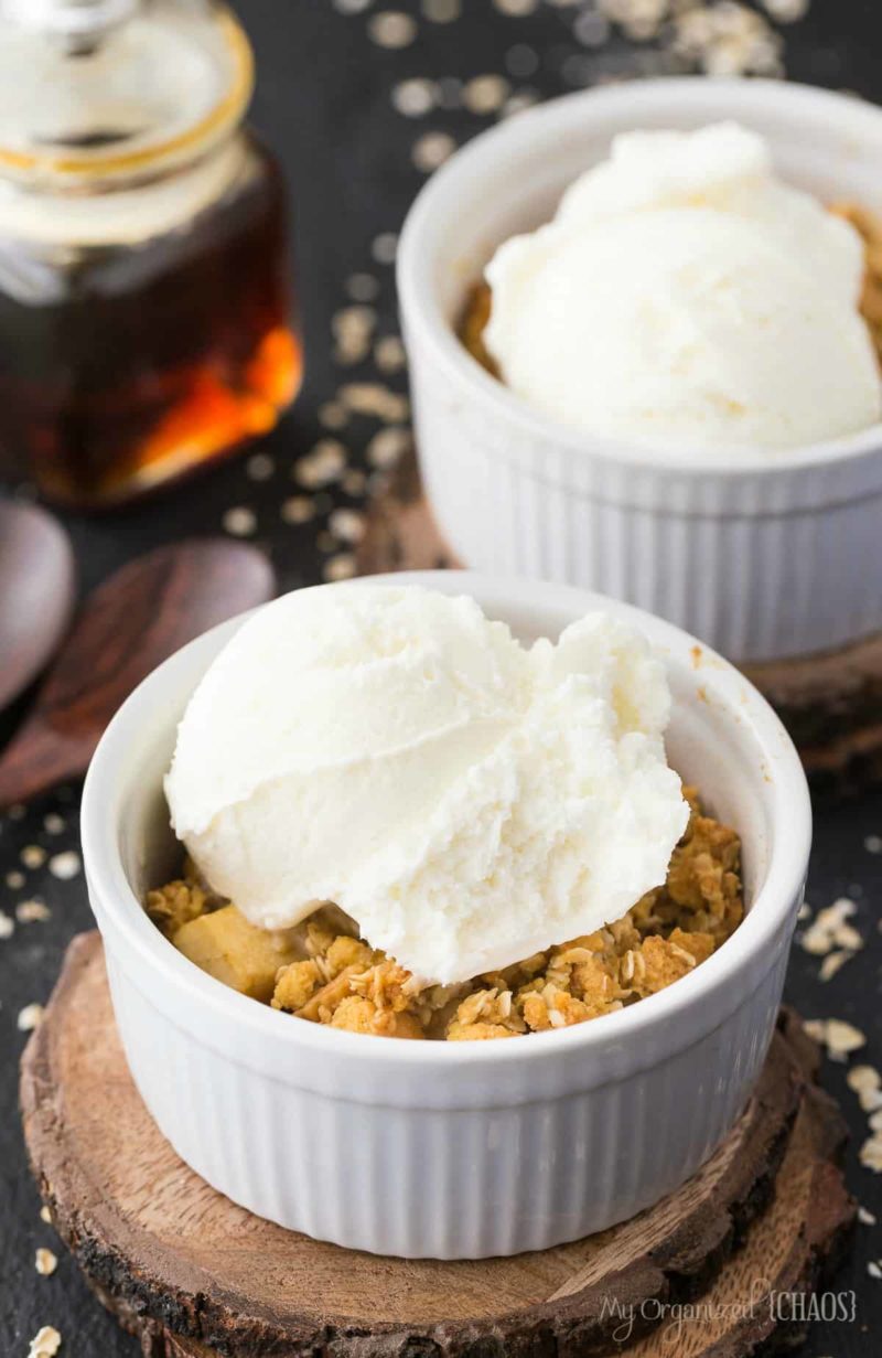 A plate of food, with Maple apple crisp and Cream