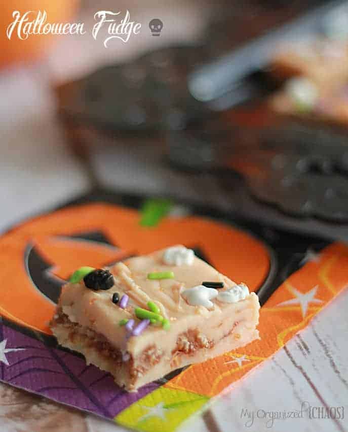 Halloween Fudge recipe using White Chocolate and mini Halloween chocolate bars. Easy to make and so good, they'll disappear