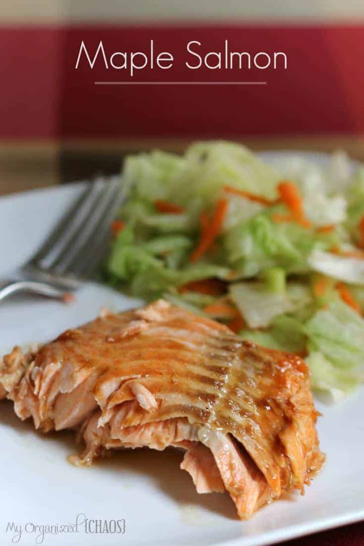 A close up of a plate of food with a fork, with Salmon