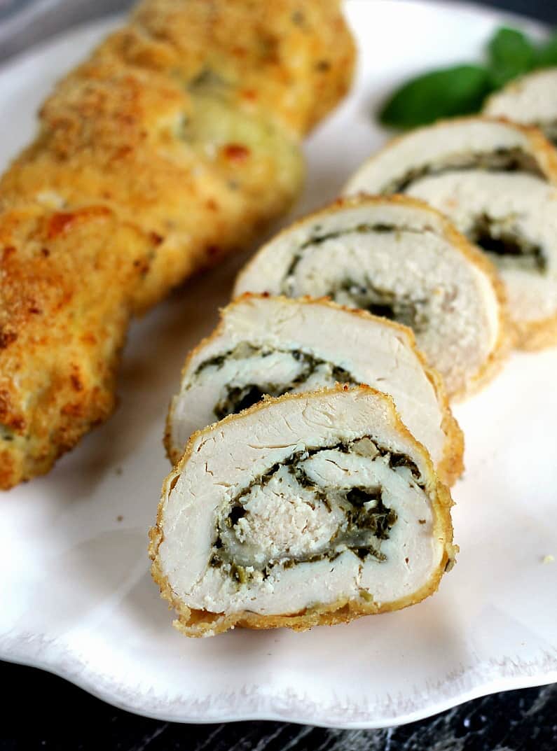 Pesto Cheese Stuffed Chicken Rolls with mozzarella and a delicious nut-free pesto. This recipe for chicken breasts is one you just have to try!