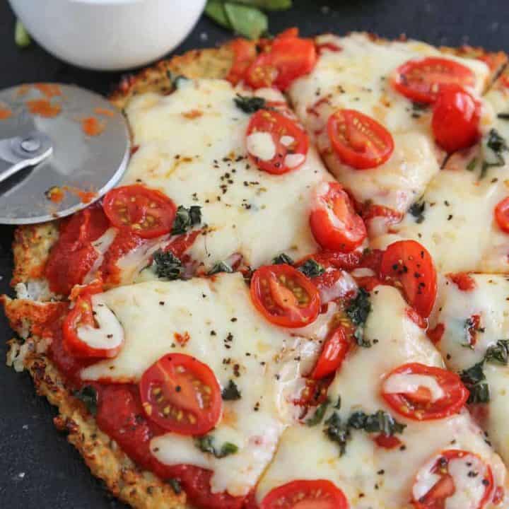 Easy Cheesy Cauliflower Crust Pizza, crispy crust that is close to traditional - but Low-Carb and Low-Calorie. Uses Armstrong Cheese Monterey Jack with Jalapeno