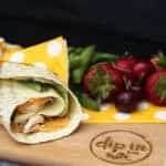 A wrap sitting on top of a wooden table