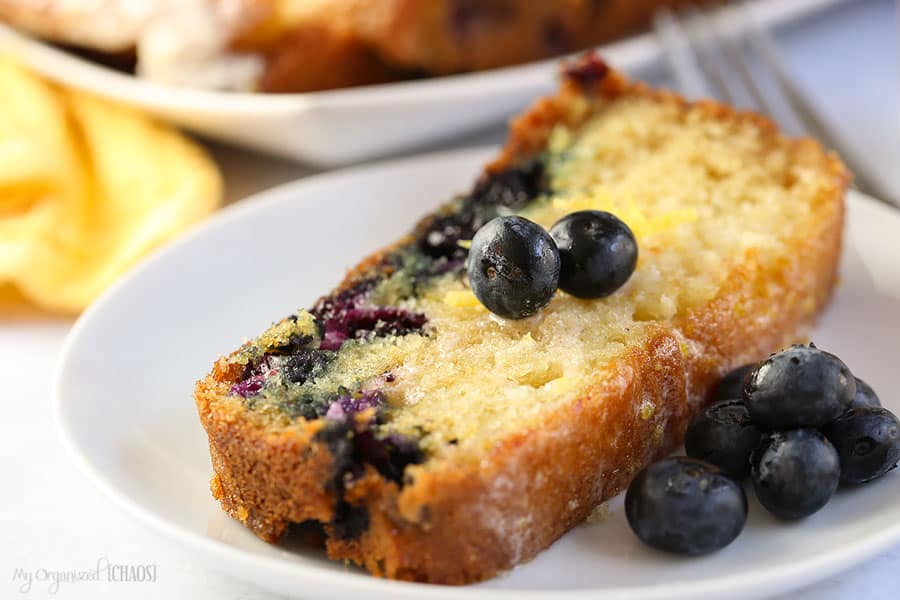 A close up of food on a plate, with Cake and Blueberry