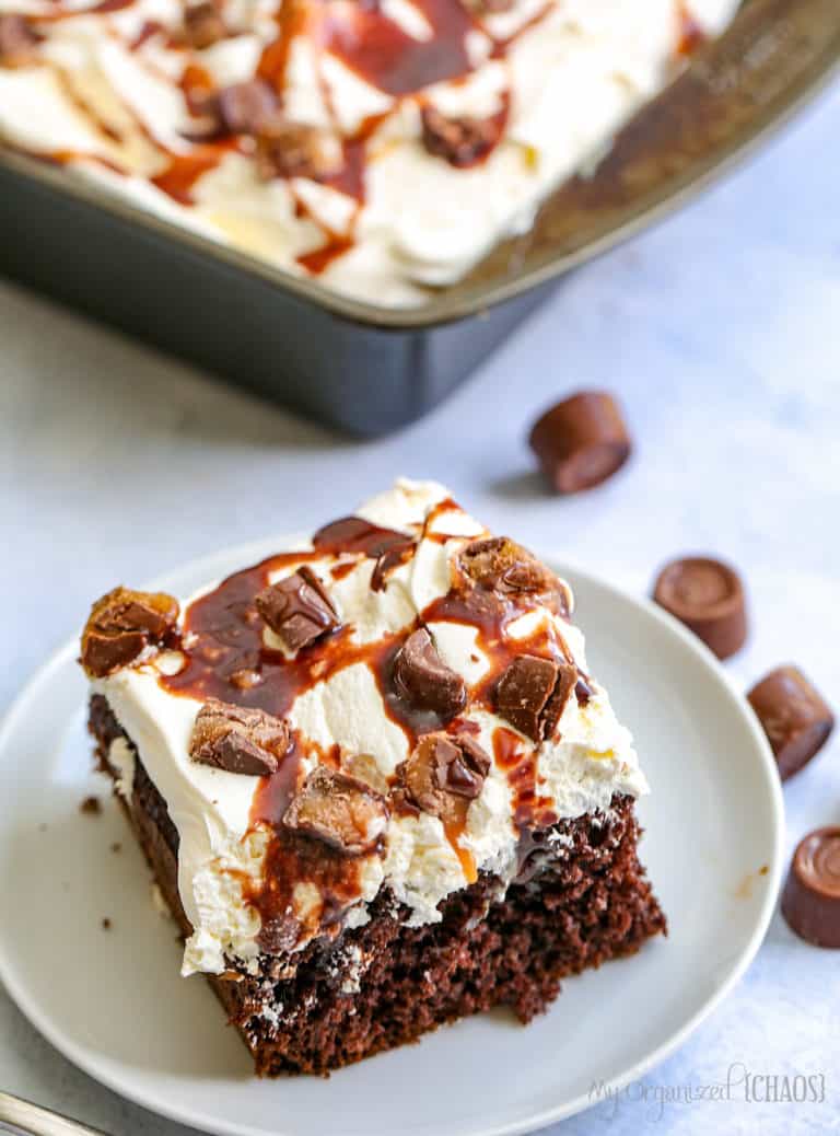A slice of cake on a plate, with Chocolate Poke Cake