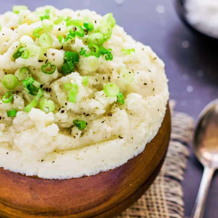 A close up of a plate of food, with Cauliflower and Mashed potato