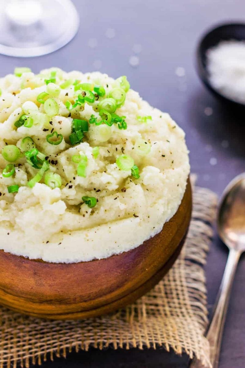 A close up of a plate of food, with Cauliflower and Mashed potato