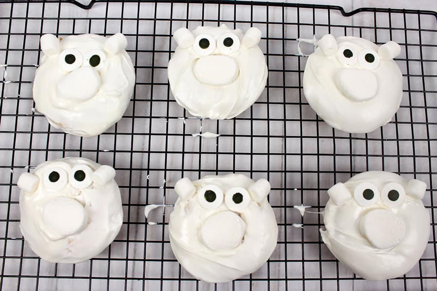 This Polar Bear Donuts recipe uses a box cake mix for ease. They will be the highlight of a school or activity holiday party, or bagged for exchanges