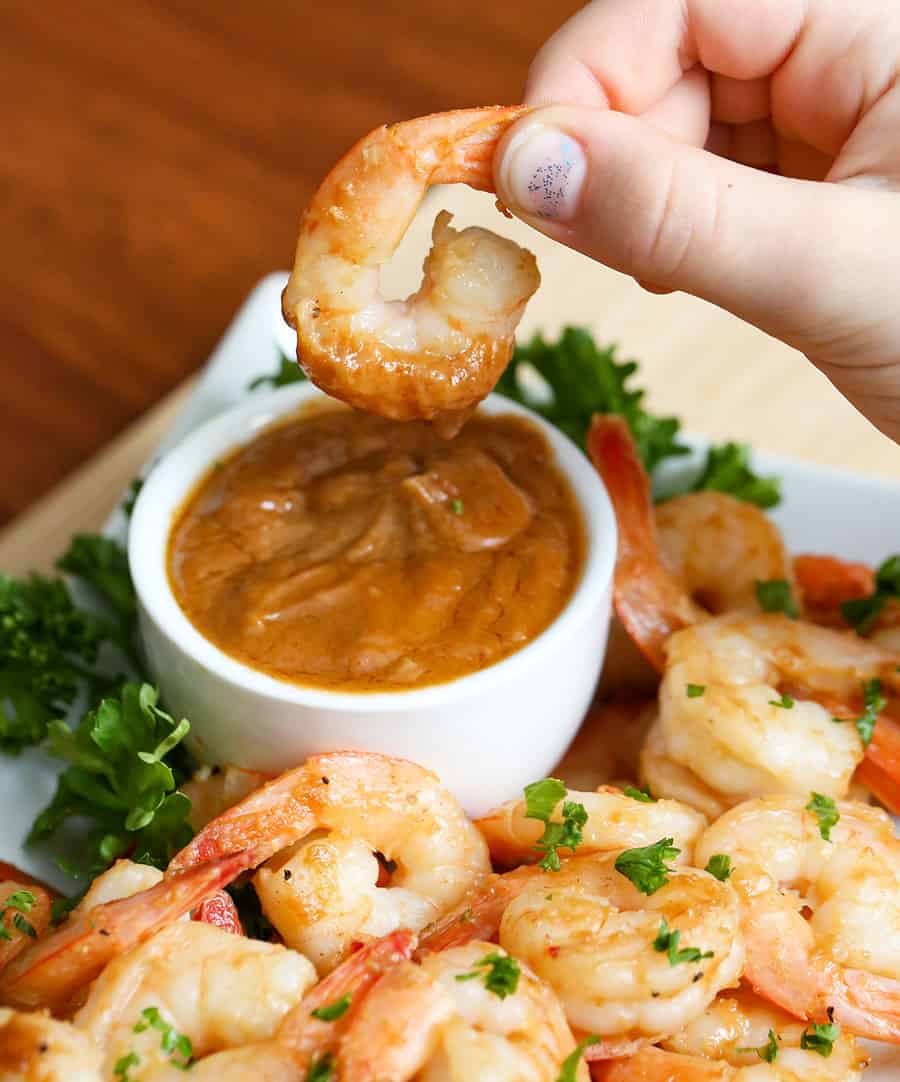 A bowl of food, with Shrimp and Sauce