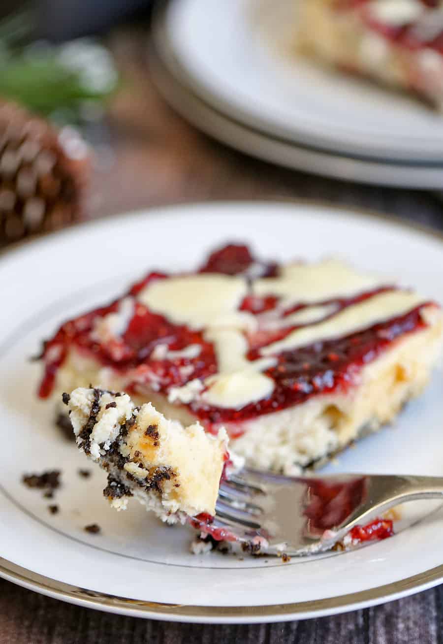 cheesecake on a plate, with Cheesecake and raspberry jam