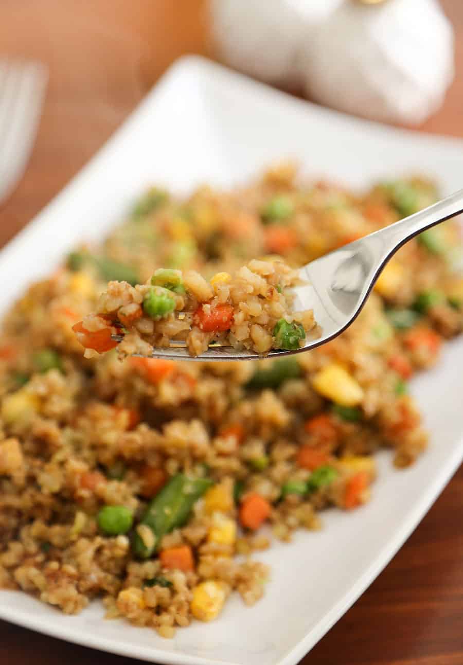 If you love Chinese fried rice, but don't enjoy the carb count that comes with it, you'll love this easy Cauliflower Fried Rice recipe. It takes few ingredients, can be ready in 15-20 minutes and is loaded with vegetables.