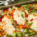 A dish is filled with food, with side