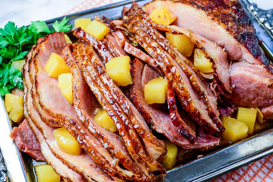 Slow Cooker Ham is a classic and iconic meal, yet there's so many variations on this recipe. Here is my go-to for the best Slow Cooker Brown Sugar Pineapple Ham ever, easy to make with just 5 ingredients - and so delicious!