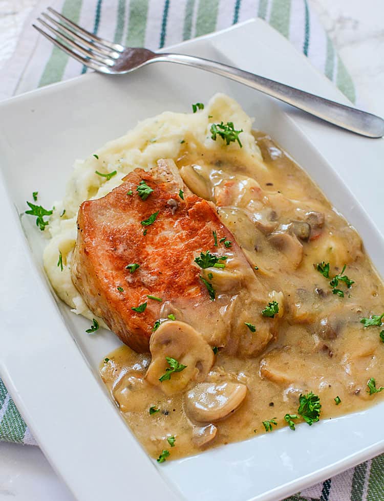 This Instant Pot Pork Chops recipe just may become your favourite pork chop recipe altogether. With a seared outside and a tender middle, the meat is smothered in a delicious mushroom gravy. Ideal for busy nights when we're short on time but still want a homemade dinner that's quick and easy.