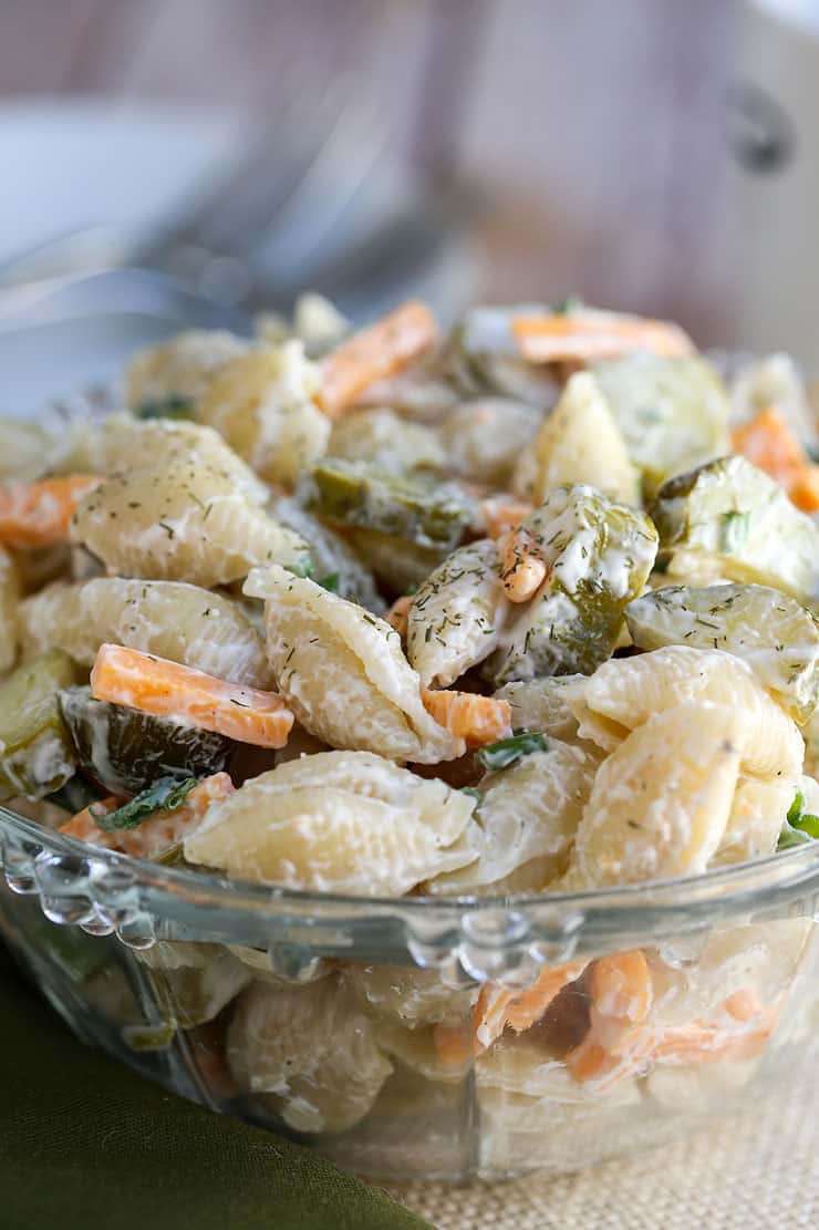 a bowl of dill pickle pasta salad.