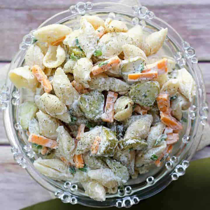 Calling all dill pickle lovers, this salad recipe is for you! This creamy Dill Pickle Pasta Salad is THE BEST and has the tangy flavour of crunchy pickles, fresh dill, cheese, mayo and sour cream. It's the perfect side for any BBQ or summer meal.