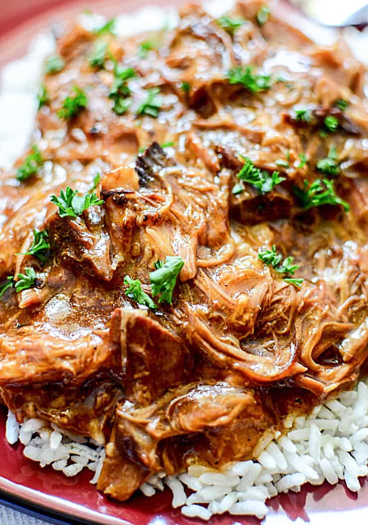 This easy 6-ingredient recipe for Slow Cooker Cherry Coke BBQ Pulled Pork has that smoky BBQ and sweet cola flavour that makes for a tender, juicy, and flavourful pulled pork.
