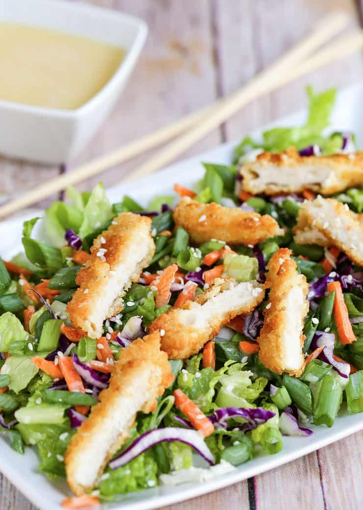 This Oriental Chicken Salad is an Applebee's copycat recipe. A tasty salad with a homemade asian inspired dressing - so fresh, delicious and good for you! 