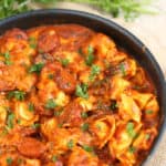 A pan filled with food, with Sausage and Tortellini