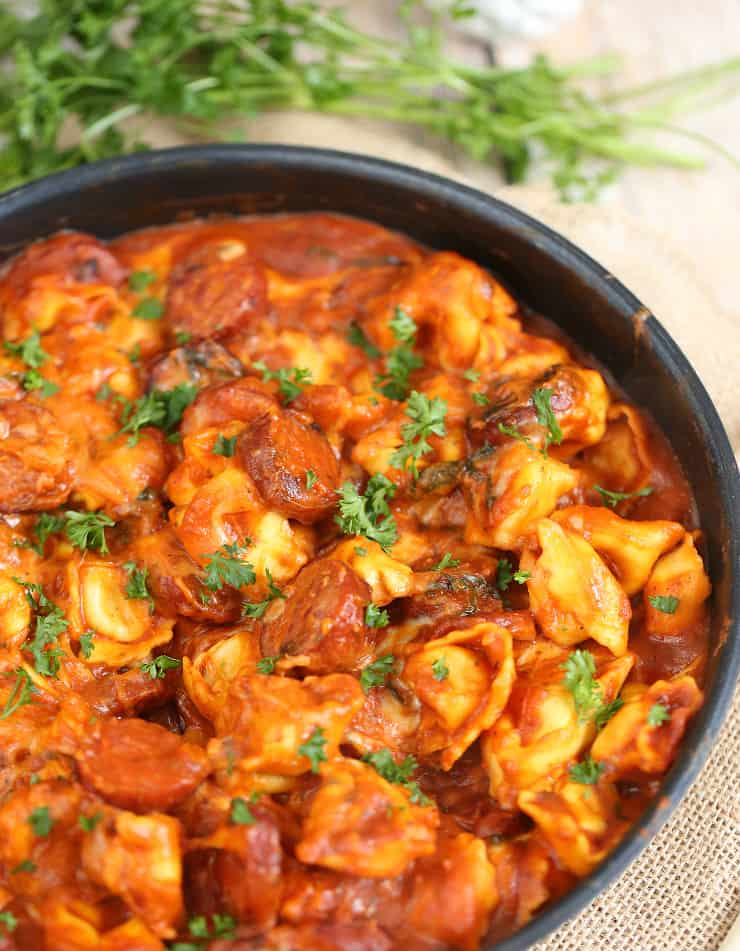 This One Pan Cheesy Sausage & Tortellini Skillet is a quick and delicious meal that uses few ingredients. The whole family will love this easy Italian dish, which is so perfect for those busy weeknights.
