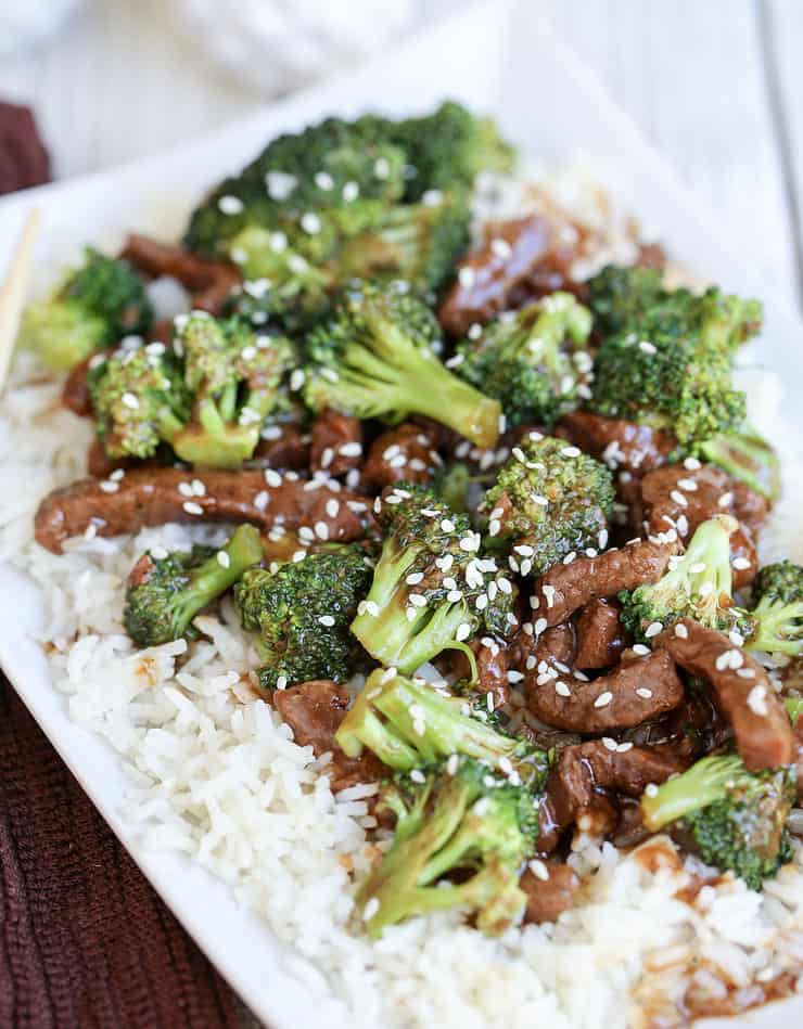 A plate of food with broccoli, with Beef and Sauce