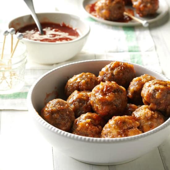 A plate of food on a table, with Meatball and Cranberry