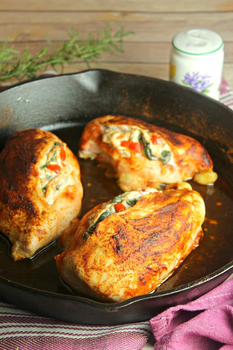 A pan filled with food, with Tuscan Chicken