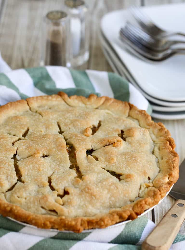 A pie sitting on top of a wooden table