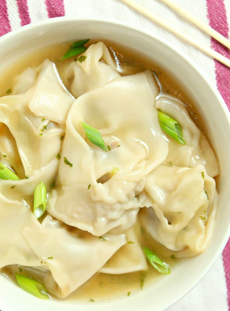 This homemade one-pot easy Wonton Soup is filled with a juicy pork and shrimp filling. It's a comforting soup recipe that will knock your socks off. 