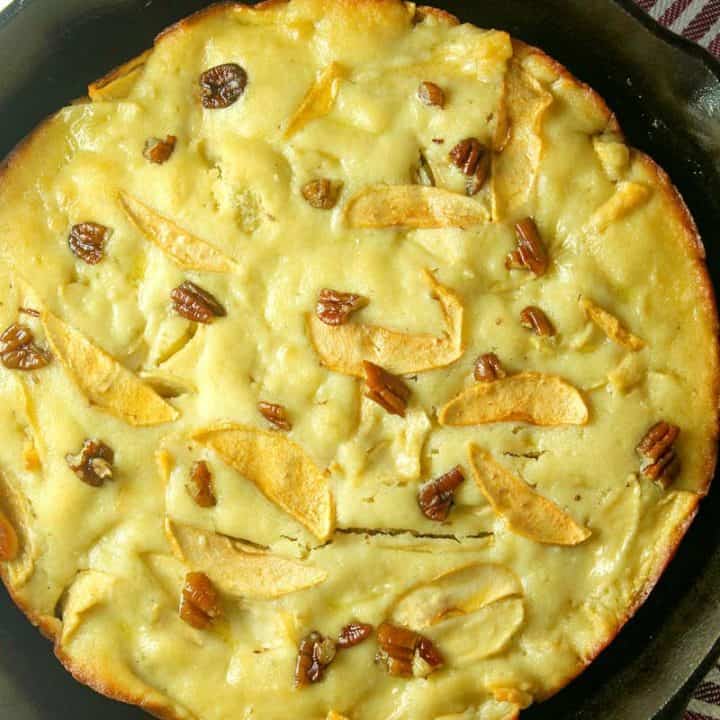 skillet cake in a cast iron pan, with Cake and Apple