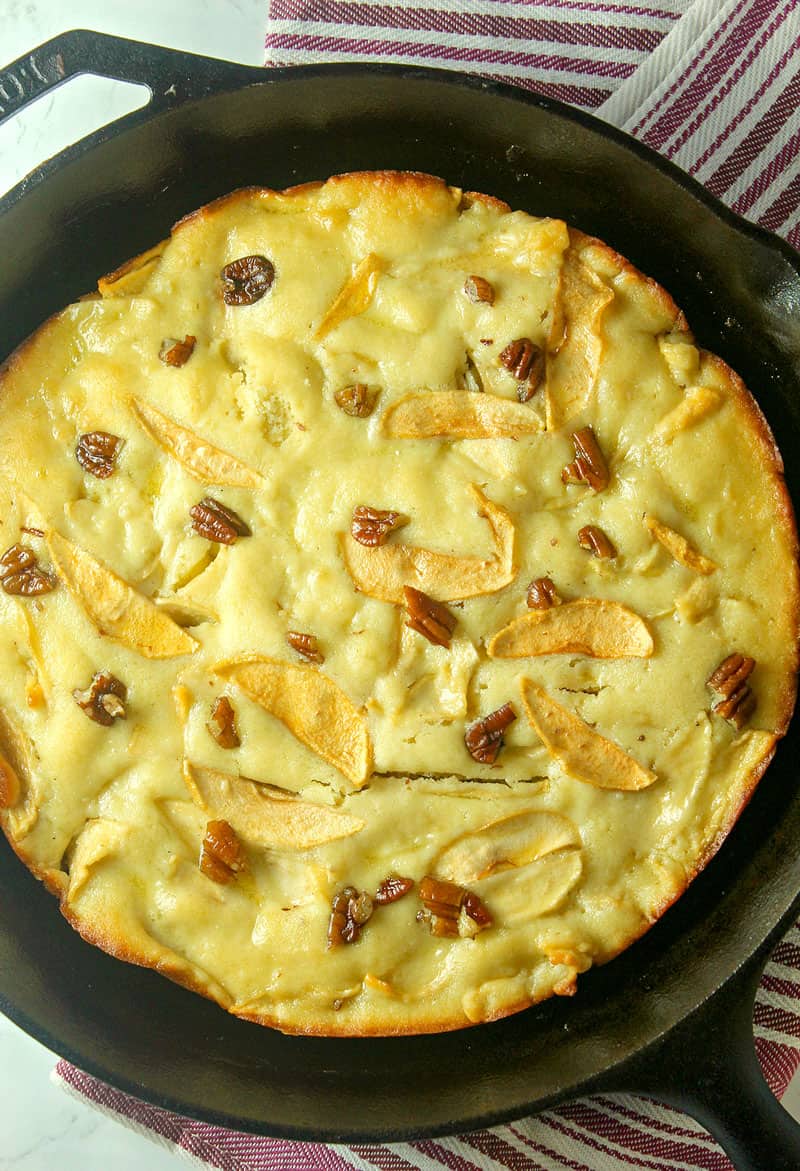 skillet cake in a cast iron pan, with Cake and Apple