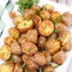 A plate of food, with Potato and Garlic