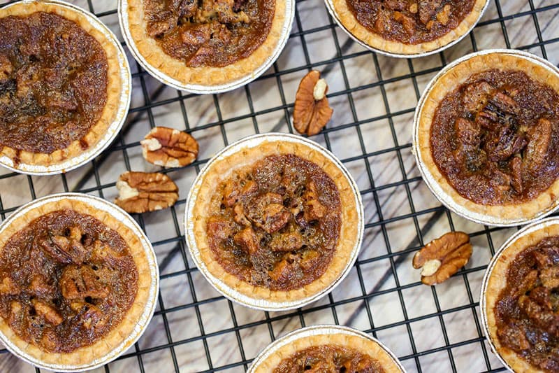 butter tarts on top of a table, with Tart and Pecan