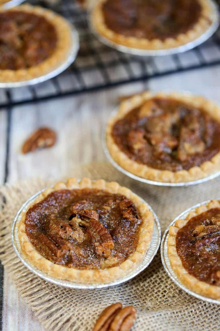 A plate of food on a table, with Butter and Tart