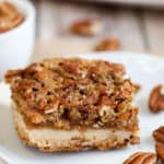 A close up of a piece of Pecan bar