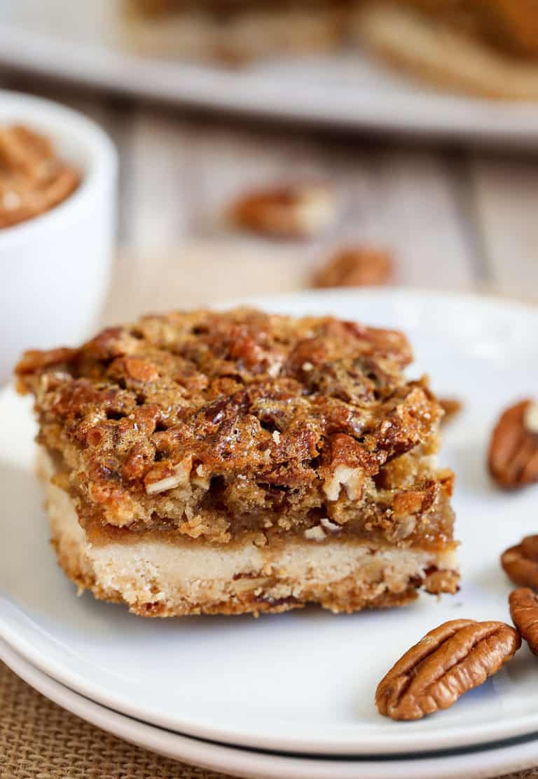 A close up of a piece of Pecan bar