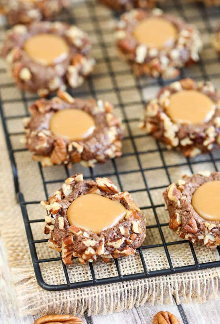 A close up of food on a rack, with turtle Cookie