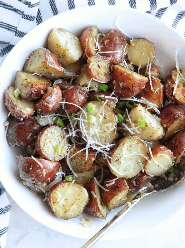 A plate of food, with Red potatoes