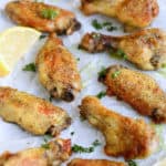 A plate of food, with Chicken and Lemon
